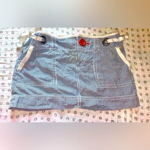 This skirt is summer size 0 striped skirt with all the cute accents EUC